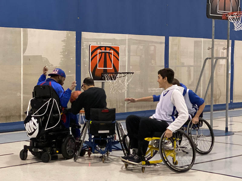 Team Midas plays Wheelchair Basketball